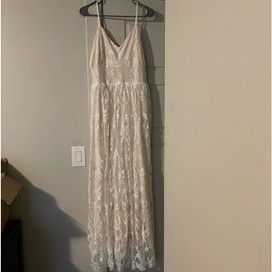 Brand new Baltic Born mid slit dress.